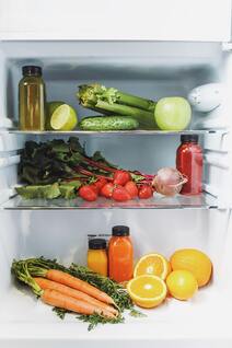 Open fridge, full of healthy food